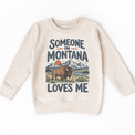 Someone in Montana Loves Me design on a natural beige sweatshirt