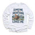 Someone in Montana Loves Me design on a white long sleeve T-shirt