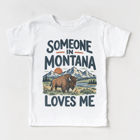 Someone in Montana Loves Me design on a white short sleeve T-shirt