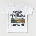 Someone in Nebraska Loves Me design on a white short sleeve T-shirt