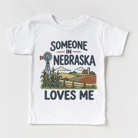 Someone in Nebraska Loves Me design on a white short sleeve T-shirt