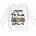 Someone in Nebraska Loves Me design on a white sweatshirt