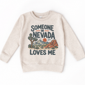 Someone in Nevada Loves Me design on a natural beige sweatshirt