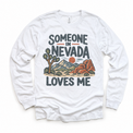 Someone in Nevada Loves Me design on a white long sleeve T-shirt