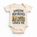 Someone in New Mexico Loves Me design on a natural beige baby bodysuit