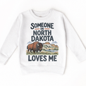 Someone in North Dakota Loves Me design on a white sweatshirt