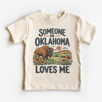Someone in Oklahoma Loves Me design on a natural beige short sleeve T-shirt