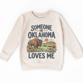 Someone in Oklahoma Loves Me design on a natural beige sweatshirt