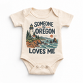 Someone in Oregon Loves Me design on a natural beige baby bodysuit