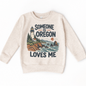 Someone in Oregon Loves Me design on a natural beige sweatshirt