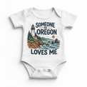 Someone in Oregon Loves Me design on a white baby bodysuit