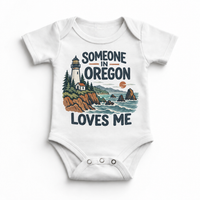 Someone in Oregon Loves Me design on a white baby bodysuit