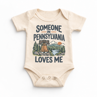 Someone in Pennsylvania Loves Me design on a natural beige baby bodysuit