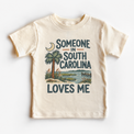Someone in South Carolina Loves Me design on a natural beige short sleeve T-shirt