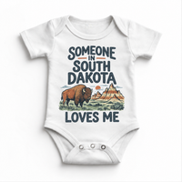 Someone in South Dakota Loves Me design on a white baby bodysuit