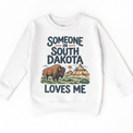 Someone in South Dakota Loves Me design on a white sweatshirt
