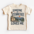 Someone in Tennessee Loves Me design on a natural beige short sleeve T-shirt