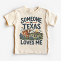Someone in Texas Loves Me design on a natural beige short sleeve T-shirt