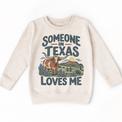 Someone in Texas Loves Me design on a natural beige sweatshirt