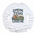 Someone in Texas Loves Me design on a white long sleeve T-shirt