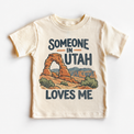 Someone in Utah Loves Me design on a natural beige short sleeve T-shirt