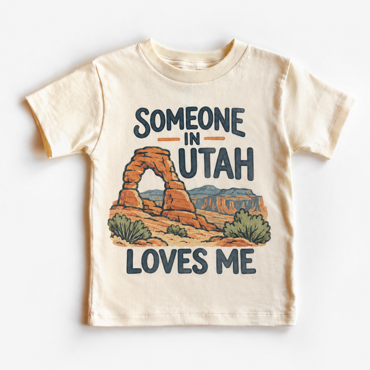 Someone in Utah Loves Me design on a natural beige short sleeve T-shirt