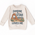 Someone in Utah Loves Me design on a natural beige sweatshirt