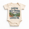 Someone in West Virginia Loves Me design on a natural beige baby bodysuit