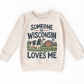 Someone in Wisconsin Loves Me design on a natural beige sweatshirt