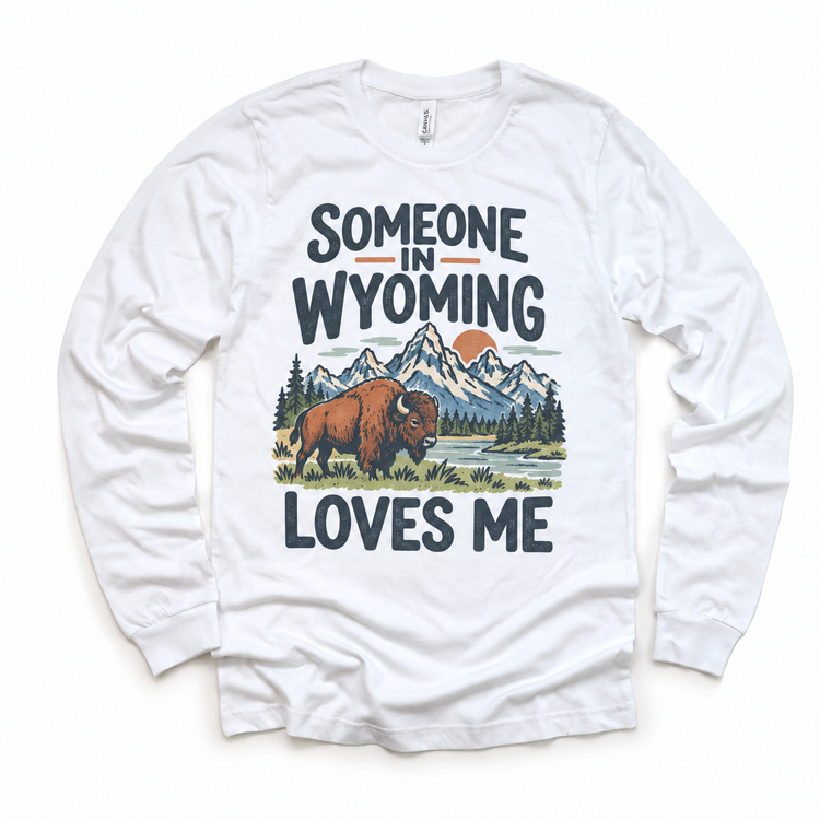 Someone in Wyoming Loves Me design on a white long sleeve T-shirt
