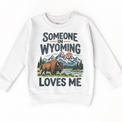 Someone in Wyoming Loves Me design on a white sweatshirt